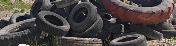 old tyres on waste land